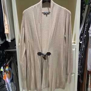 Renuar cardigan, beige with brown leather closure.